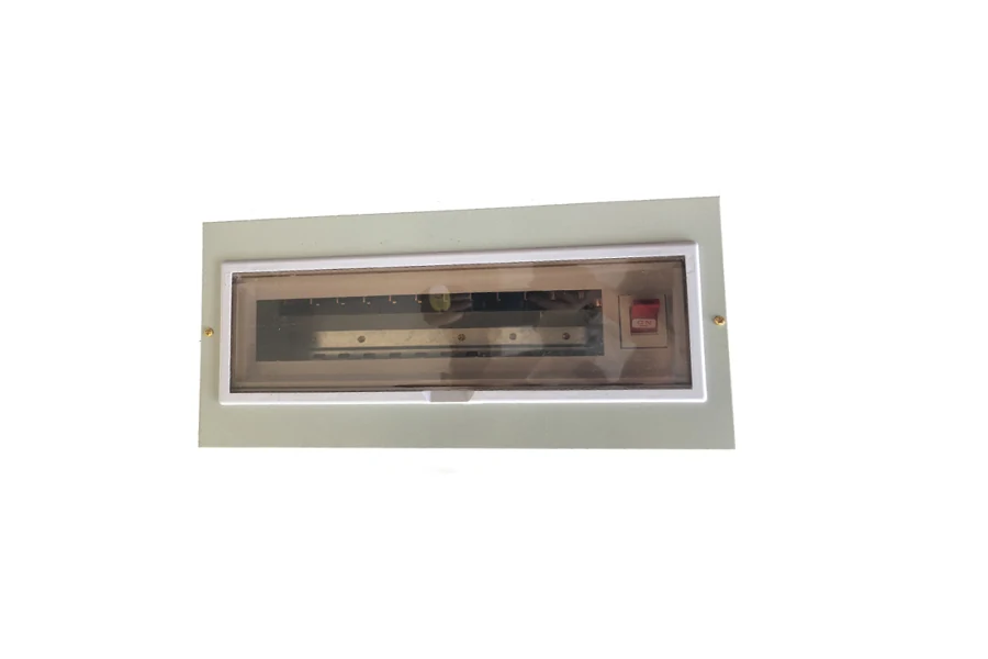 Front view of distribution board with DIN rail and internal copper bars visible