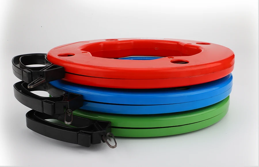 Steel fish tape in use during wall wiring installation