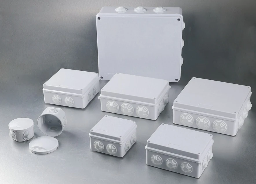 RA series waterproof junction box mounted on a wall with cables entering from multiple points