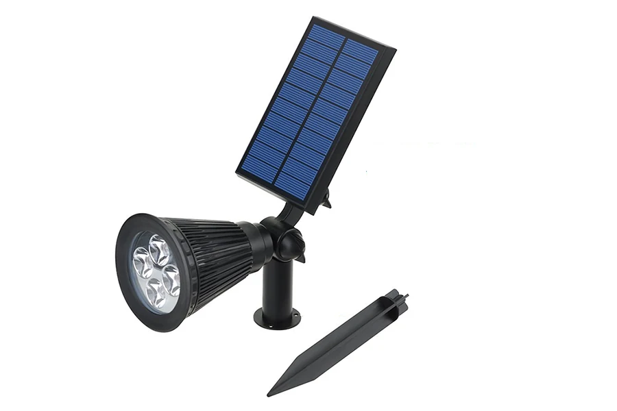 Solar spot light mounted on a wall with a visible solar panel and motion sensor