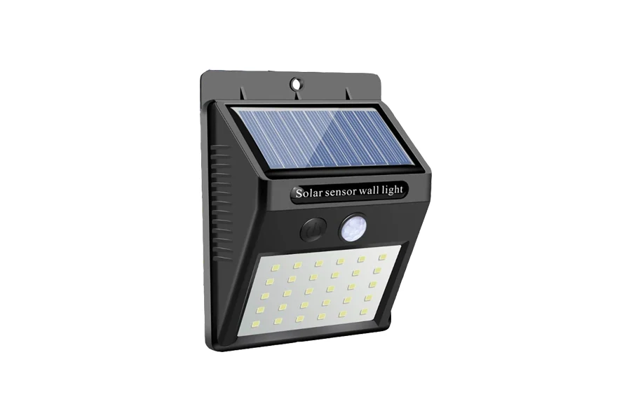 Solar wall light mounted on a wall, showing the solar panel and light housing