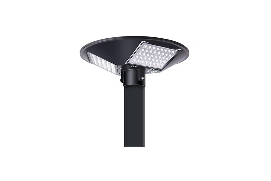 Solar-powered UFO light mounted on a wall, showing the plastic housing and solar panel
