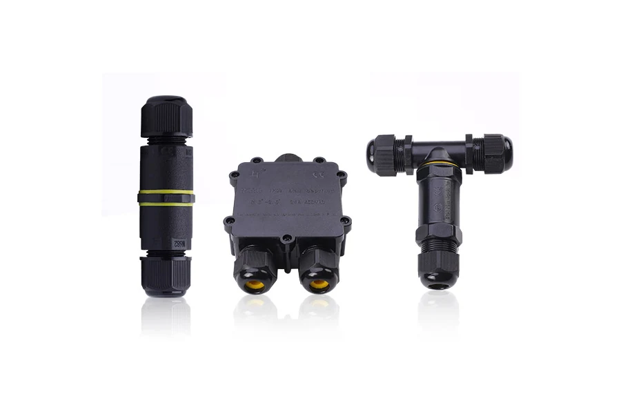 Waterproof connector with plastic housing, showing sealed mating ends
