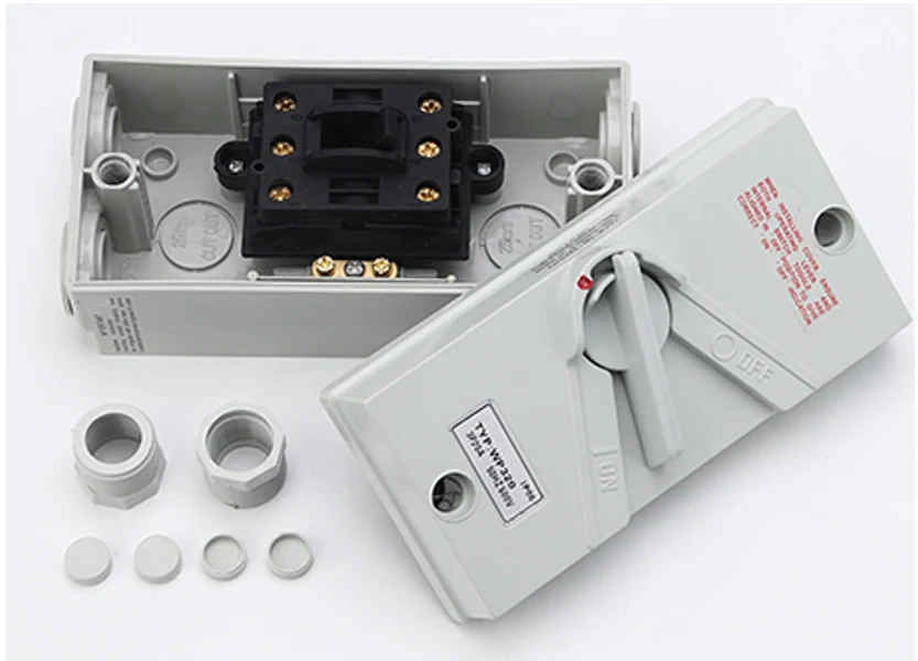 Close-up of the isolator's front face, highlighting the switch handle and mounting holes