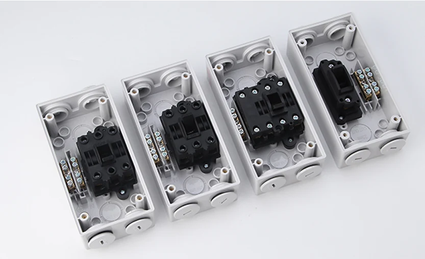 Side view of the isolator showing the plastic body and wiring terminals