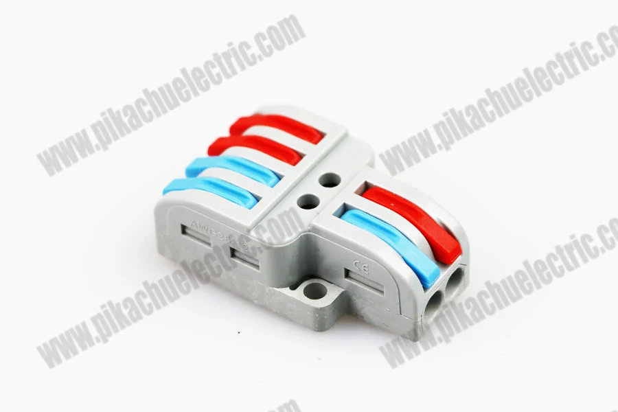 Wiring quick connector being used to join two stripped wires in a junction box