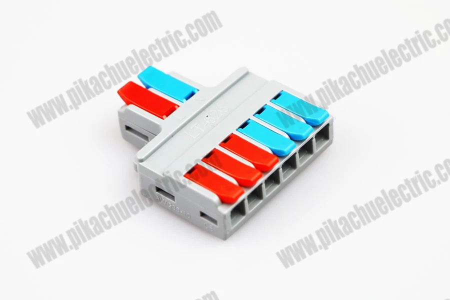 Wiring quick connector being used to join two wires in a distribution board setup