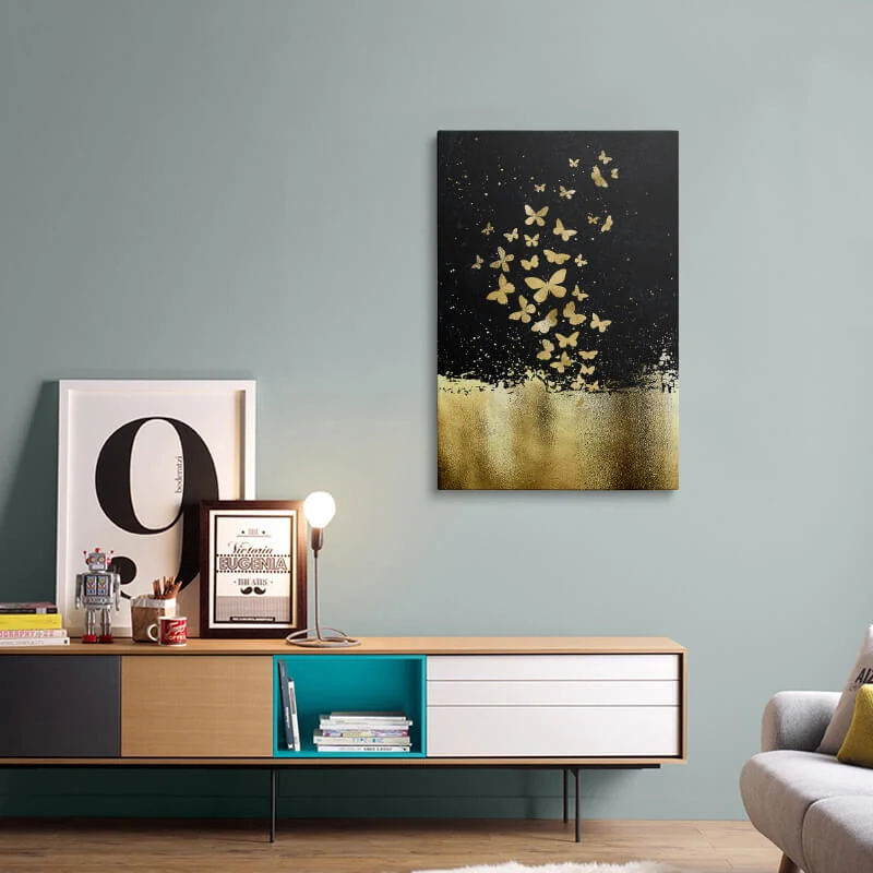 Black Gold Butterflies canvas hung above a sideboard in a living room