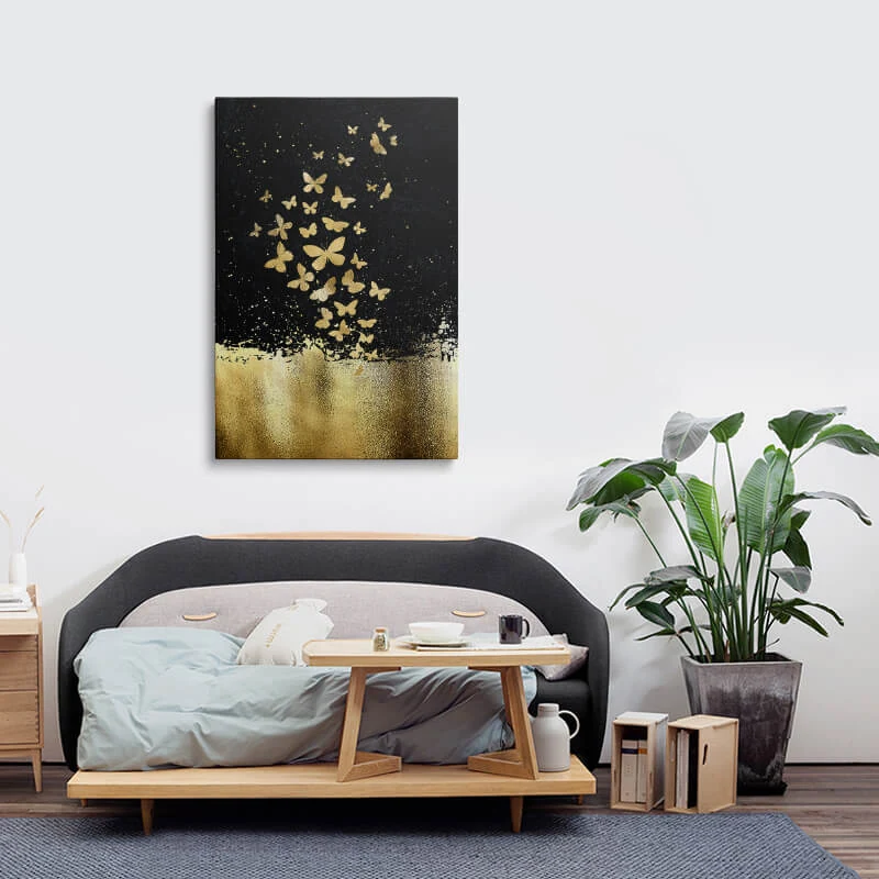 Black Gold Butterflies canvas hung above a sofa in a lounge