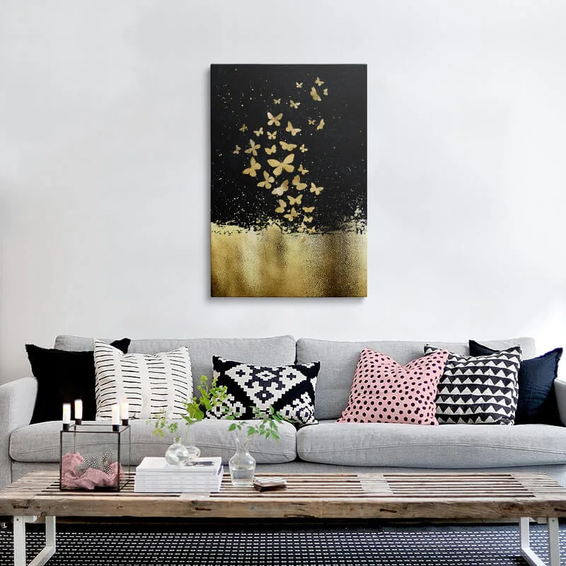 Black Gold Butterflies canvas hung above a sofa in a living room