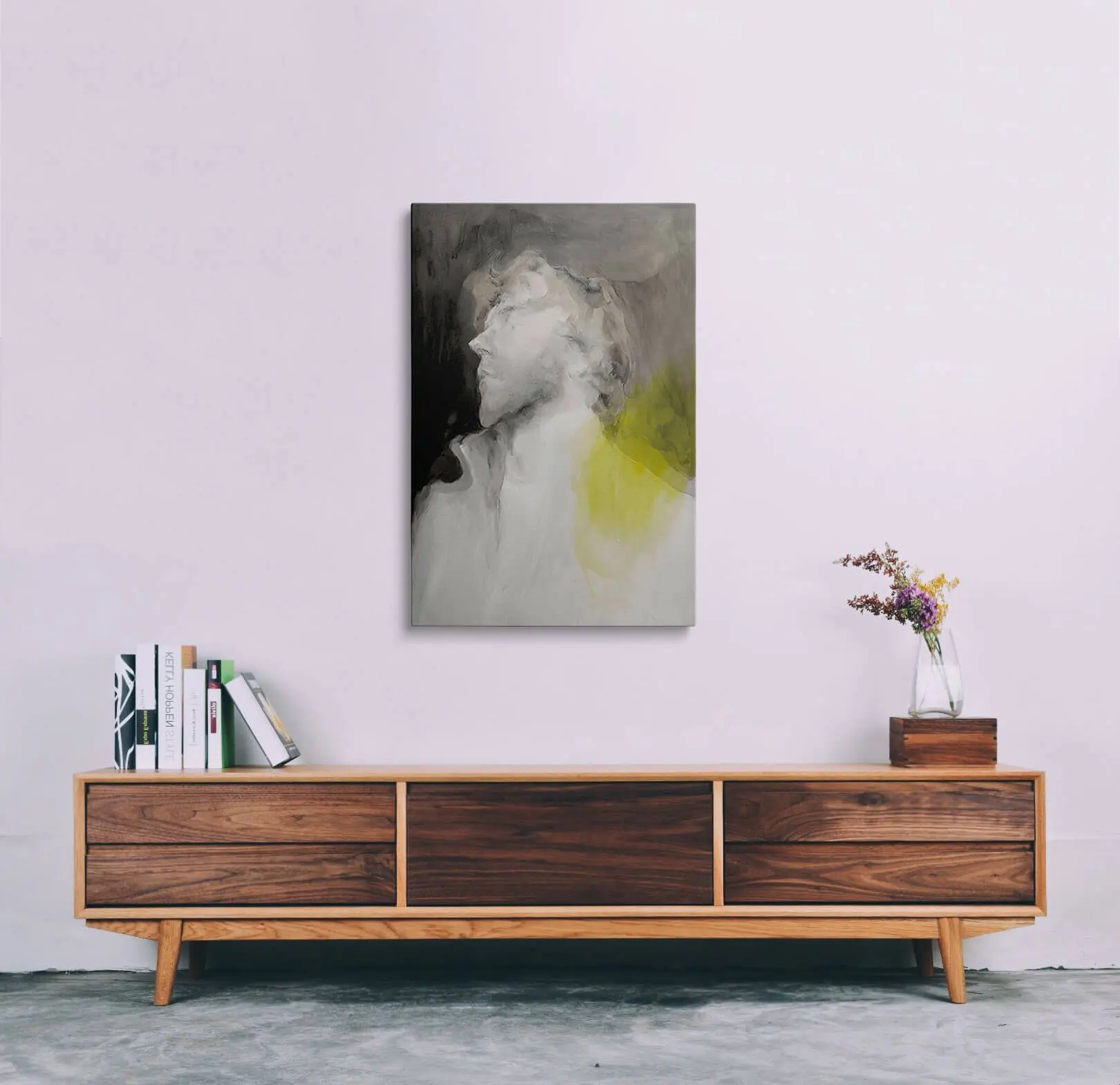 Man Abstract canvas hung above a sofa in a living room