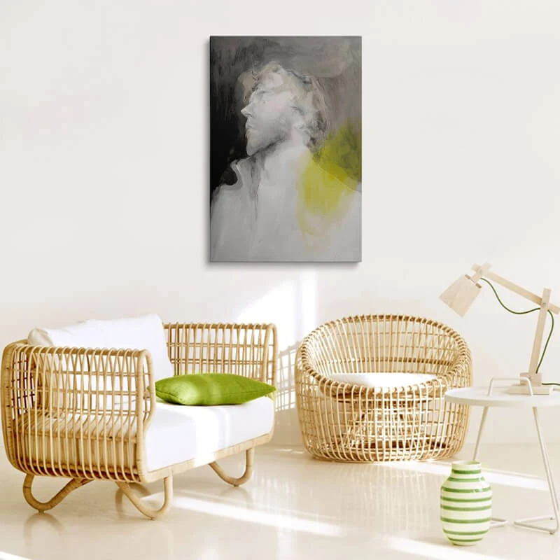 Man Abstract canvas hung above a sofa in a lounge
