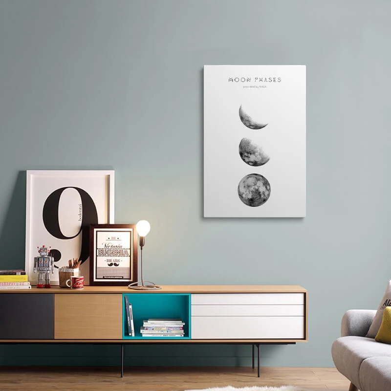 Moon Phases Picture canvas hung above a sideboard in a living room
