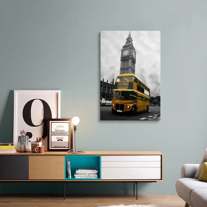 Orange London Bus canvas hung above a sofa in a living room