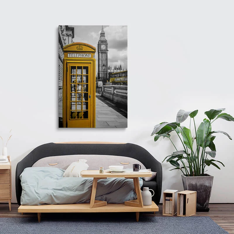 Orange London Telephone Box canvas hung above a sofa in a lounge