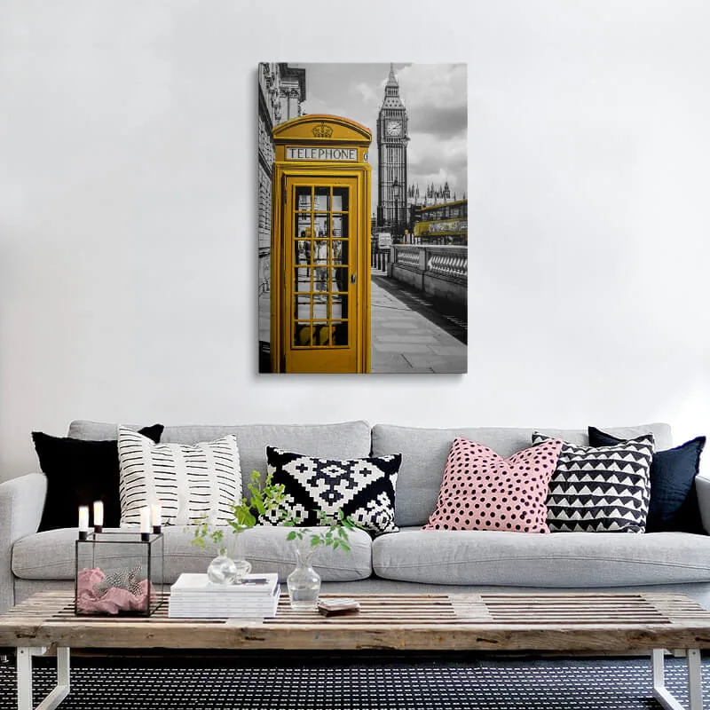 Orange London Telephone Box canvas hung above a sofa in a living room