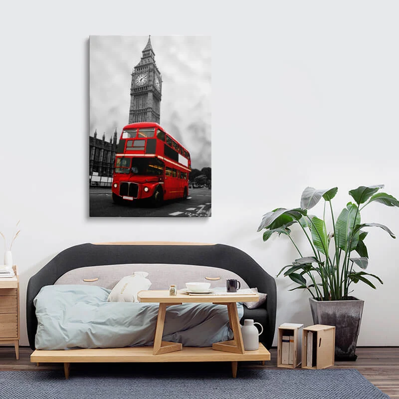 Red London Bus canvas hung above a sofa in a lounge
