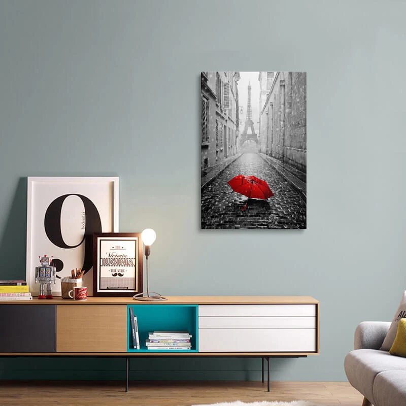 Red Umbrella Eiffel Tower canvas hung above a sideboard in a living room