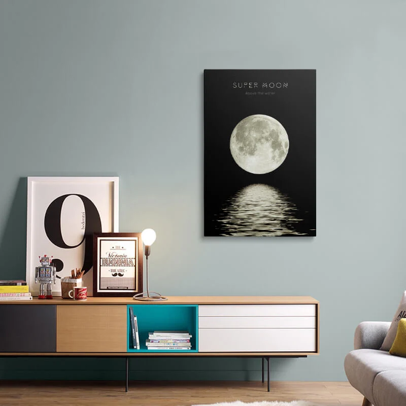 Super Moon Above The Water canvas hung above a sideboard in a living room