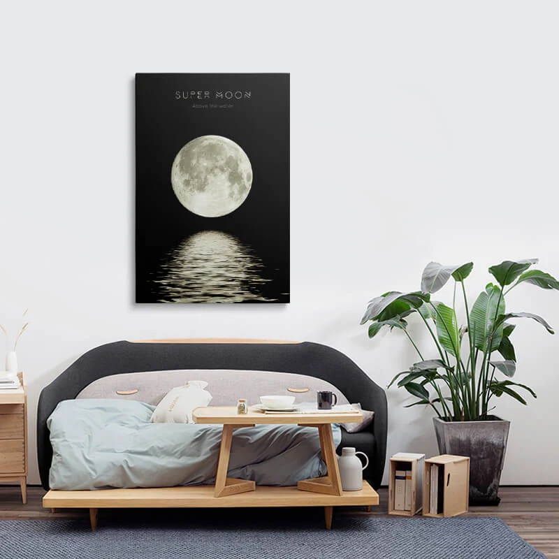 Super Moon Above The Water canvas hung above a sofa in a lounge