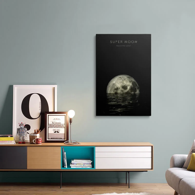Super Moon On The Water canvas hung above a sideboard in a living room