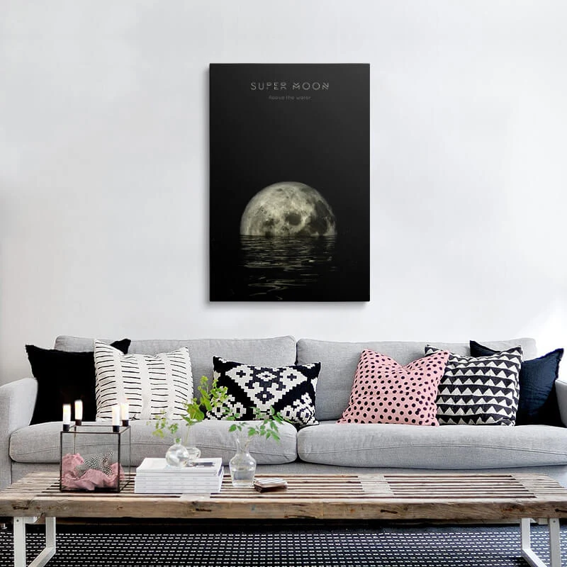 Super Moon On The Water canvas hung above a sofa in a living room