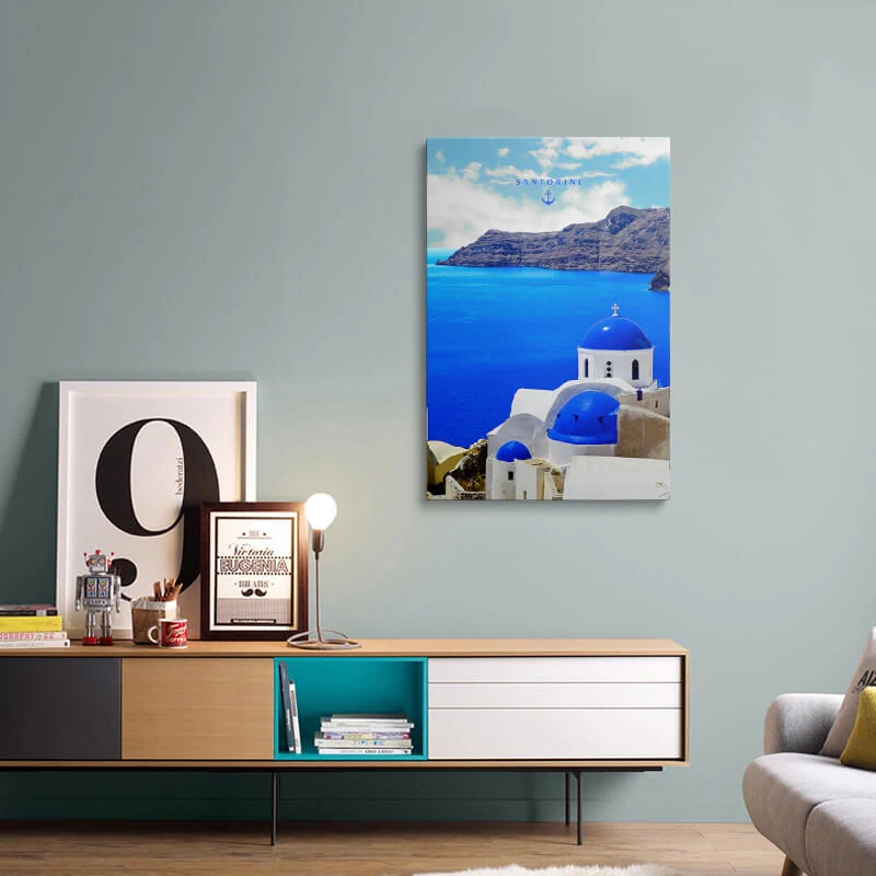 Three Bells Of Fira canvas hung above a sofa in a living room