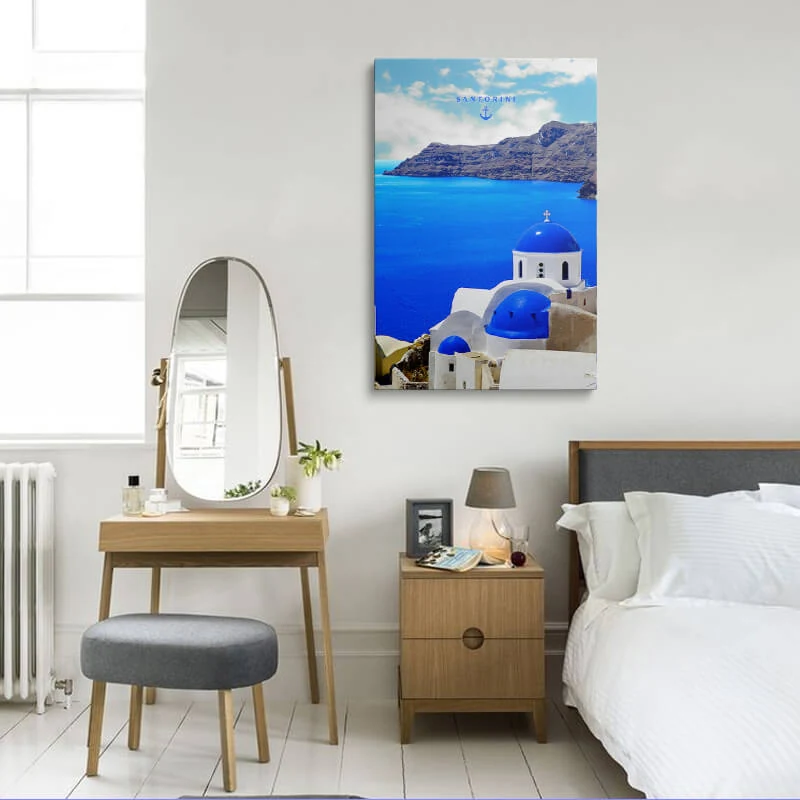 Three Bells Of Fira canvas hung above a sofa in a lounge
