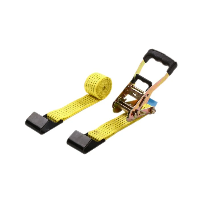 Yellow ratchet tie-down strap with black flat hooks and rubber-grip handle on a white background