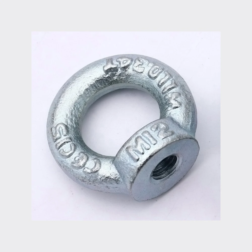 Galvanized steel lifting eye nut with internal thread and raised markings, on a white background