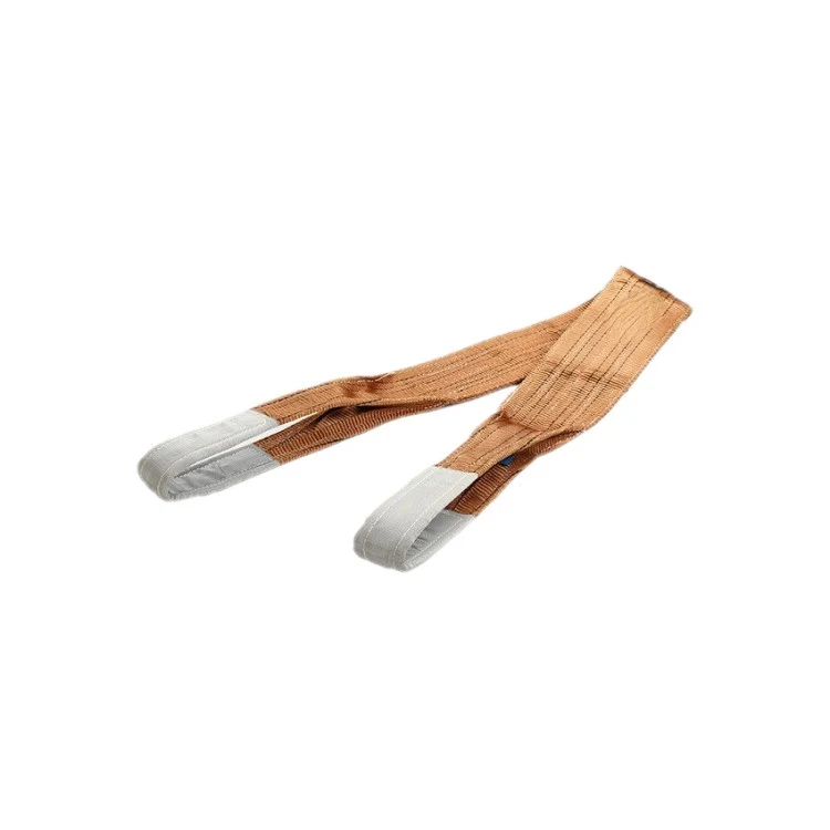 Brown woven webbing lifting sling with grey protective sleeves on both loop ends, isolated on white background