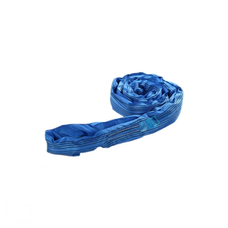 Coiled blue round lifting sling with ID label on a plain white background