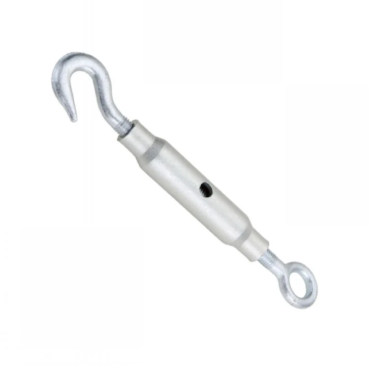 Galvanized turnbuckle with hook on one end and closed eye loop on the other, diagonal view on white background