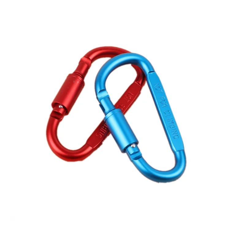 Red and blue metal carabiners linked together on a white background