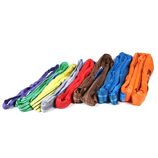 A row of colorful industrial lifting slings arranged by color on a white background