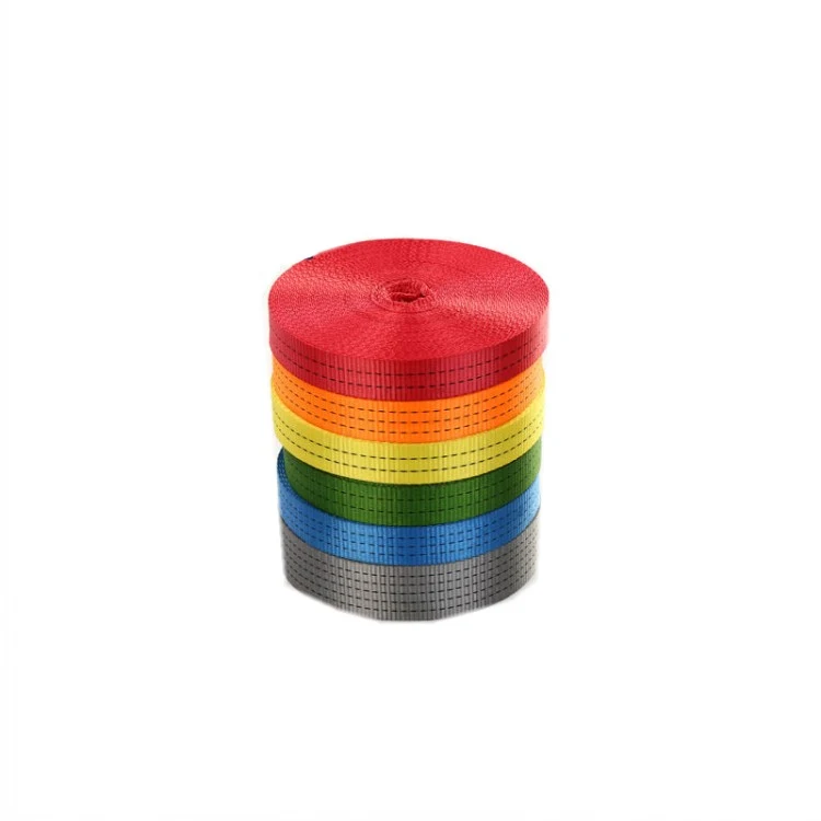 Stack of woven webbing strap rolls in red, orange, yellow, green, blue, and gray on a white background