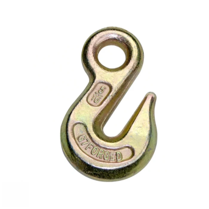 Gold-colored metal lifting hook with a closed eyelet and forged markings on a white background