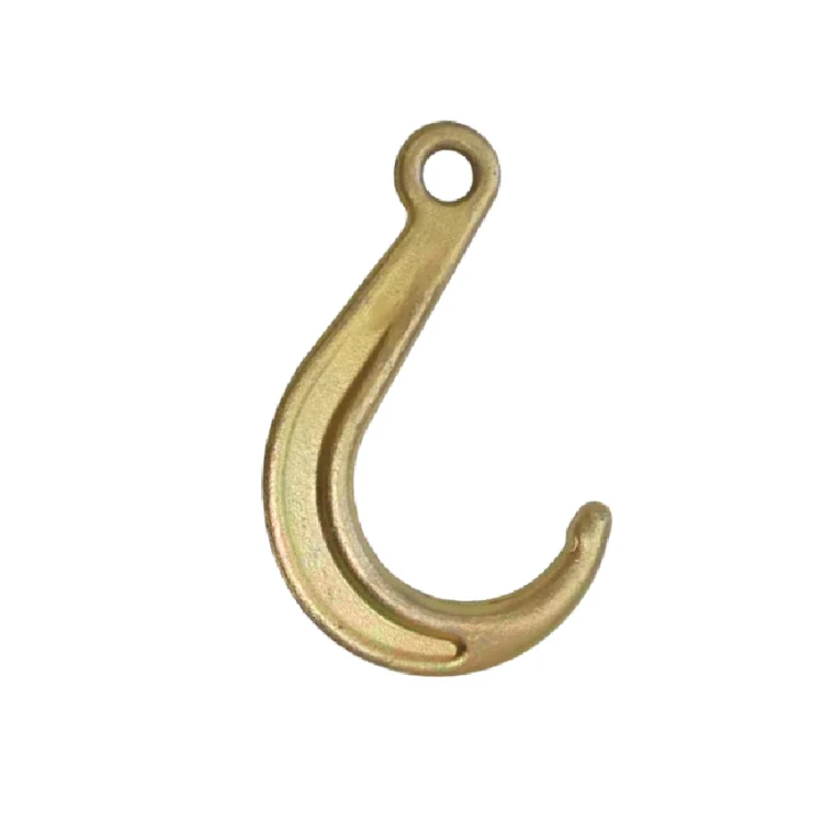 Forged gold-colored lifting eye hook with curved jaw, isolated on a white background