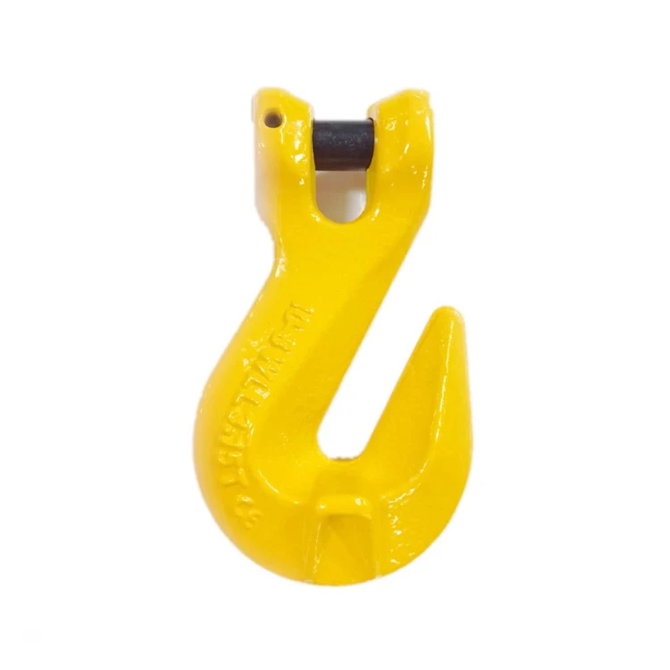 Yellow forged swivel lifting hook on a white background