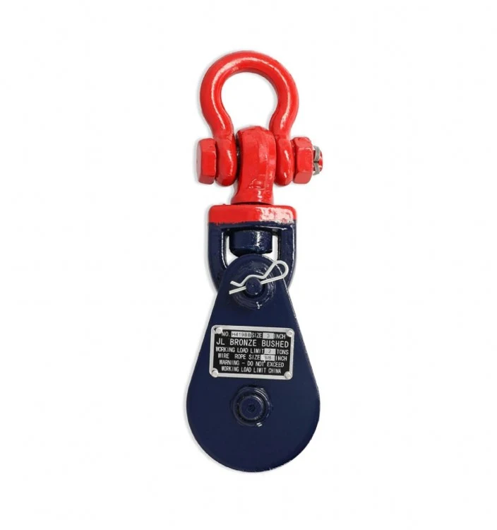 Blue and red industrial snatch block pulley with a metal shackle on a white background
