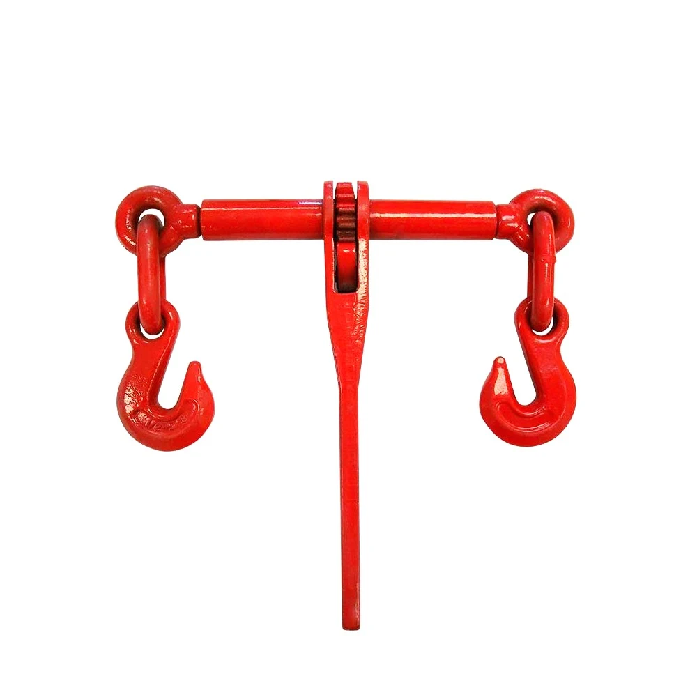 Red ratchet type load binder with a central lever handle and grab hooks at each end, shown on a white background