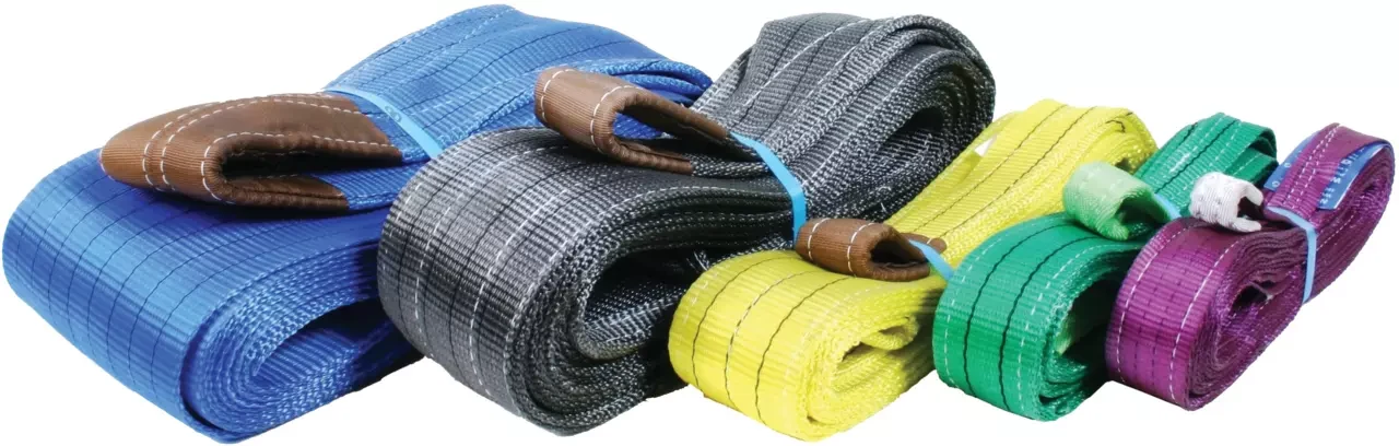 A collection of coiled synthetic lifting slings in blue, grey, yellow, green, and purple with stitched eyelets