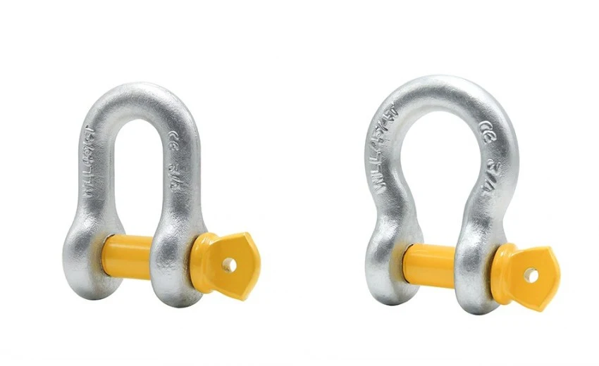 Two galvanized steel shackles with yellow pins, a chain shackle and a bow shackle, on a white background