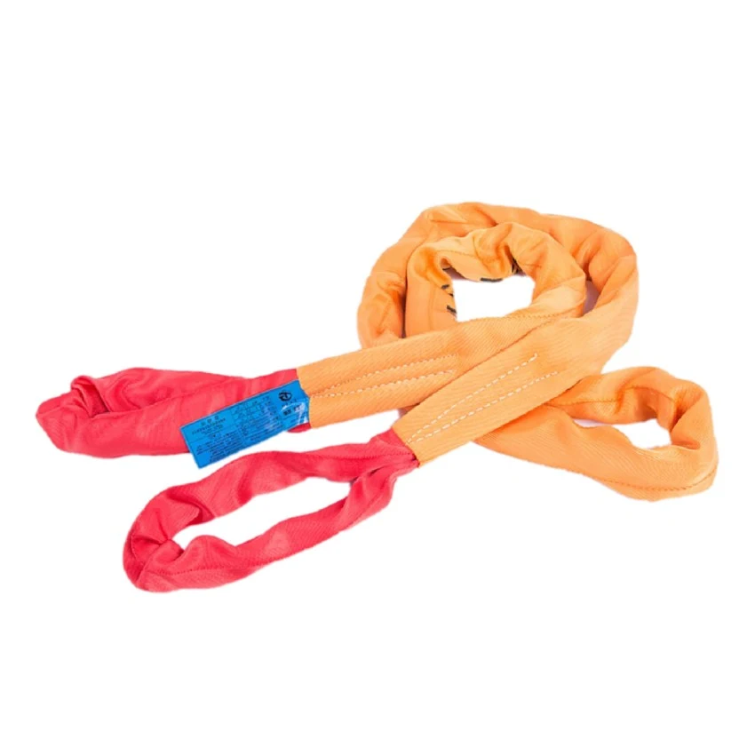 Orange round lifting sling with red reinforcement eyes and blue label tag on white background