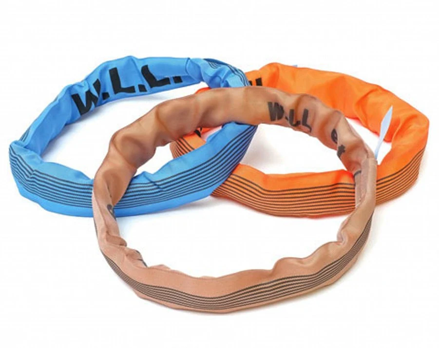 Three round lifting slings in blue, orange, and brown with WLL markings