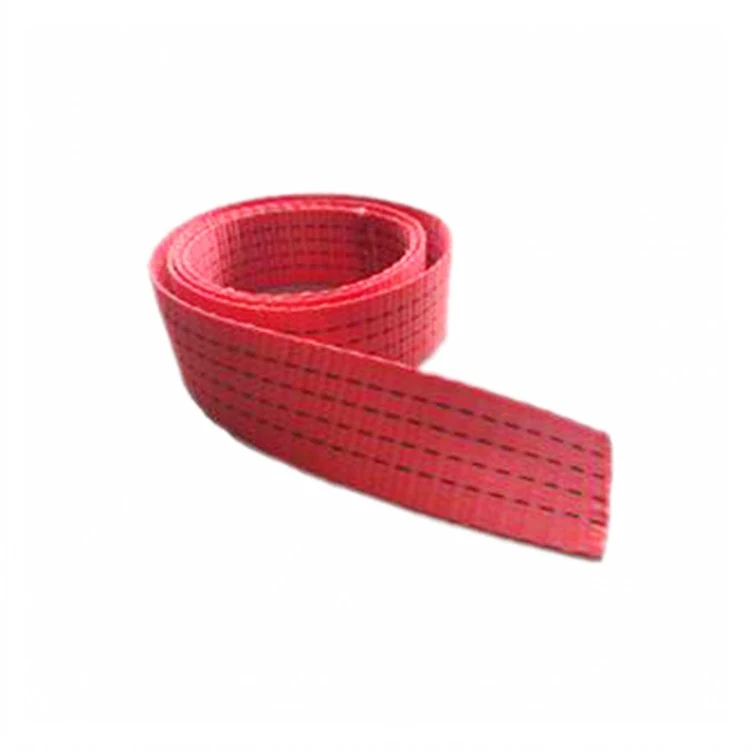Coiled red woven webbing strap with dark stitched lines on a white background