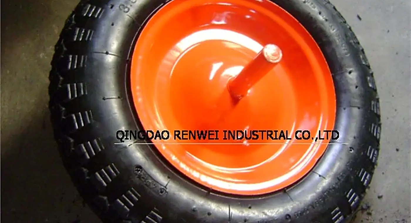 Pneumatic rubber wheel with an orange rim