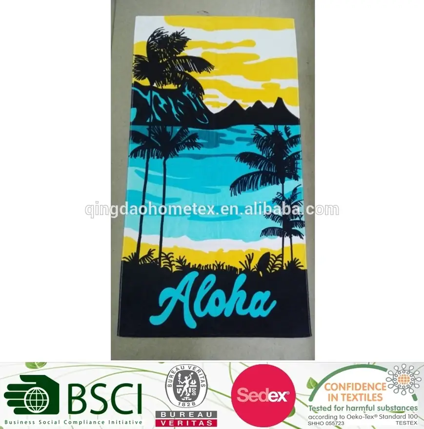 Beach towel with tropical design and Aloha text