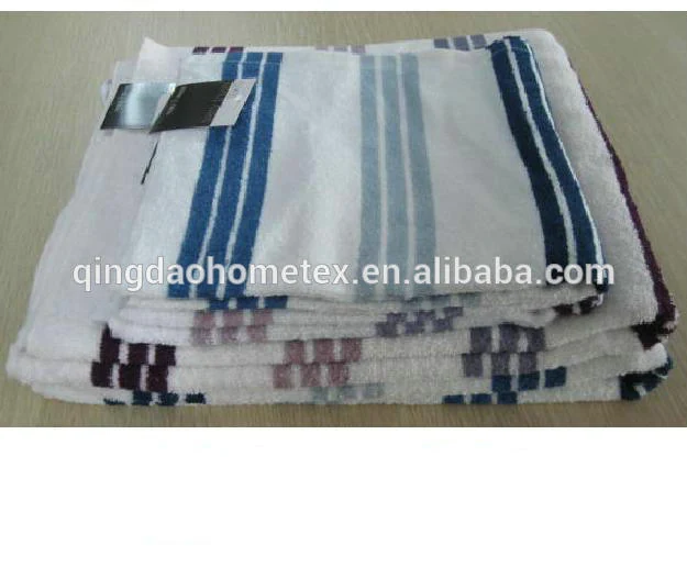 100% cotton terry hand towel with reactive printed stripe pattern, 70x30 cm, in a neutral tone