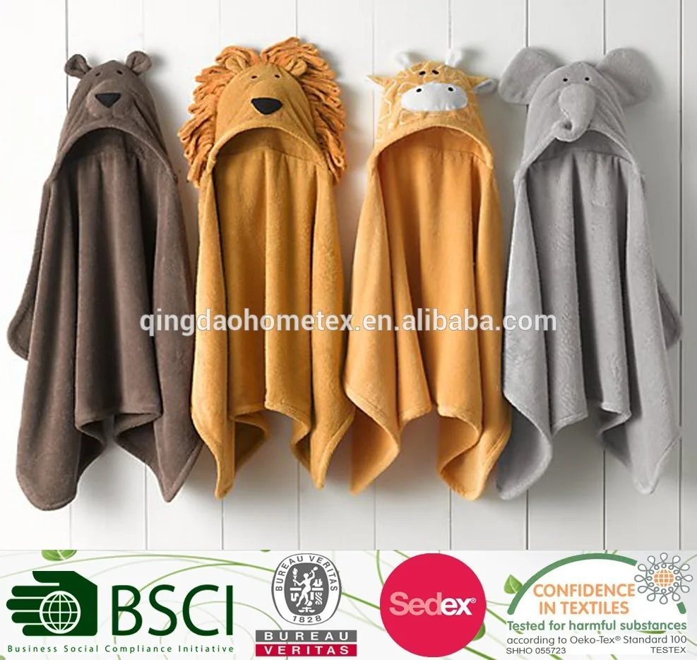 Four animal-themed hooded towels hanging on hooks with certification logos below